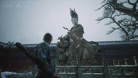 A Chinese statue stares down at the protagonist in Black Myth Wukong.