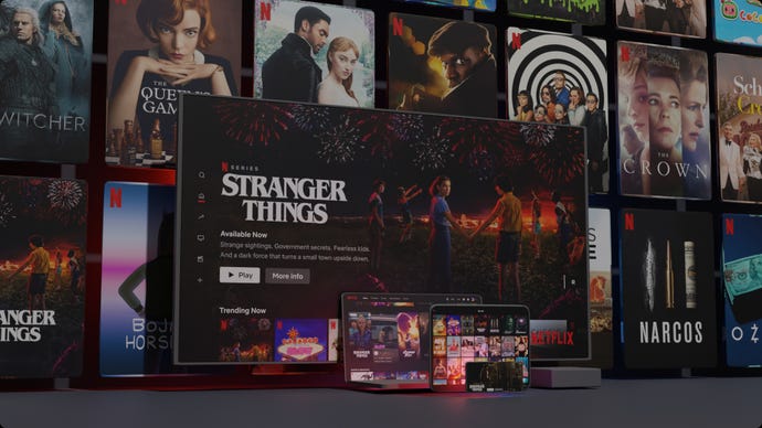 A TV, laptop, tablet, and phone all have Netflix on them, posters for various films and shows in the background.