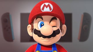 Mario's big winking face over an image of the Switch 2